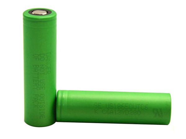 Two green 18650 lithium-ion batteries. Text on the batteries reads "DO NOT USE OUTSIDE BATTERY PACK.